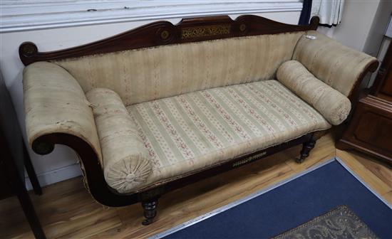 A Regency brass inlaid rosewood scroll arm settee